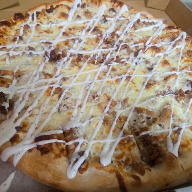 Chicken Bacon Ranch Specialty Pizza.